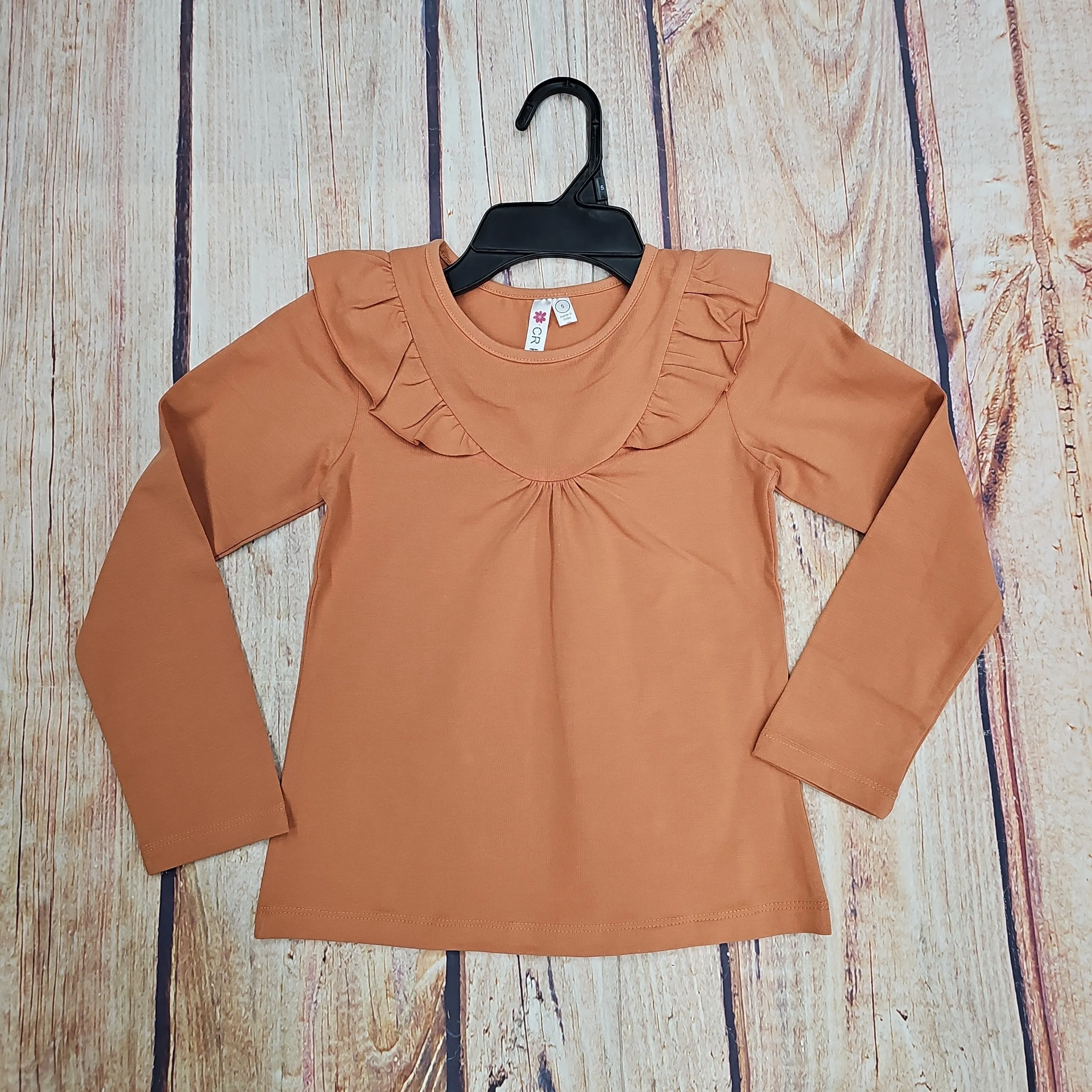 CR SPORTS BURNT ORANGE YOKE TOP